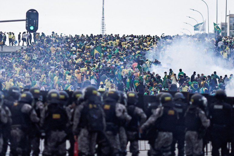 Brazil security forces stand guard as supporters of ex-President Jair Bolsonaro rally in Brasilia