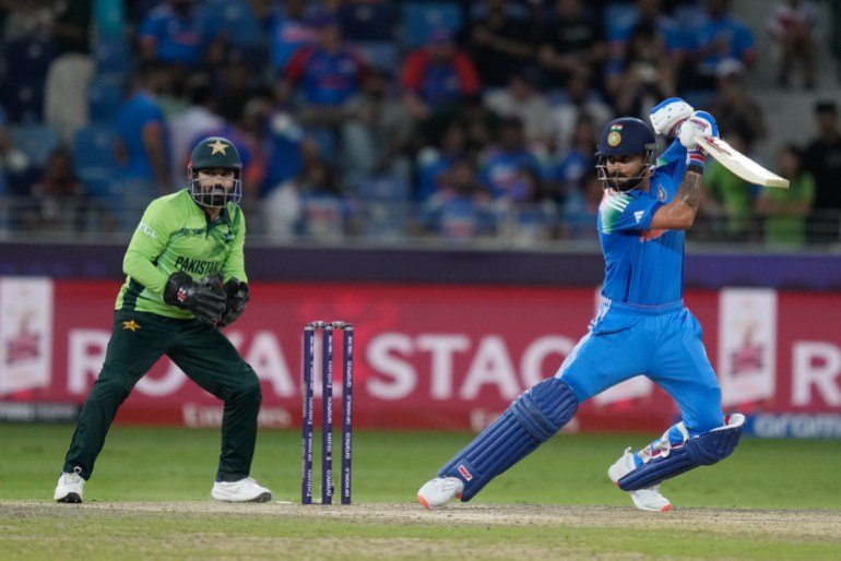 India's Virat Kohli plays a shot during the ICC Champions Trophy cricket match between India and Pakistan at Dubai International Cricket Stadium, United Arab Emirates, Sunday, Feb. 23, 2025. (AP Photo/Altaf Qadri)