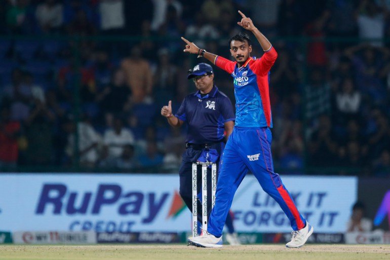 Delhi Capitals' Axar Patel celebrates the wicket of Gujarat Titans' Azmatullah Omarzai during the Indian Premier League cricket match between Delhi Capitals and Gujarat Titans in New Delhi, India, Wednesday, April 24, 2024. (AP Photo/Pankaj Nangia)