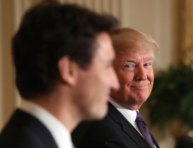 Donald Trump looks at Justin Trudeau