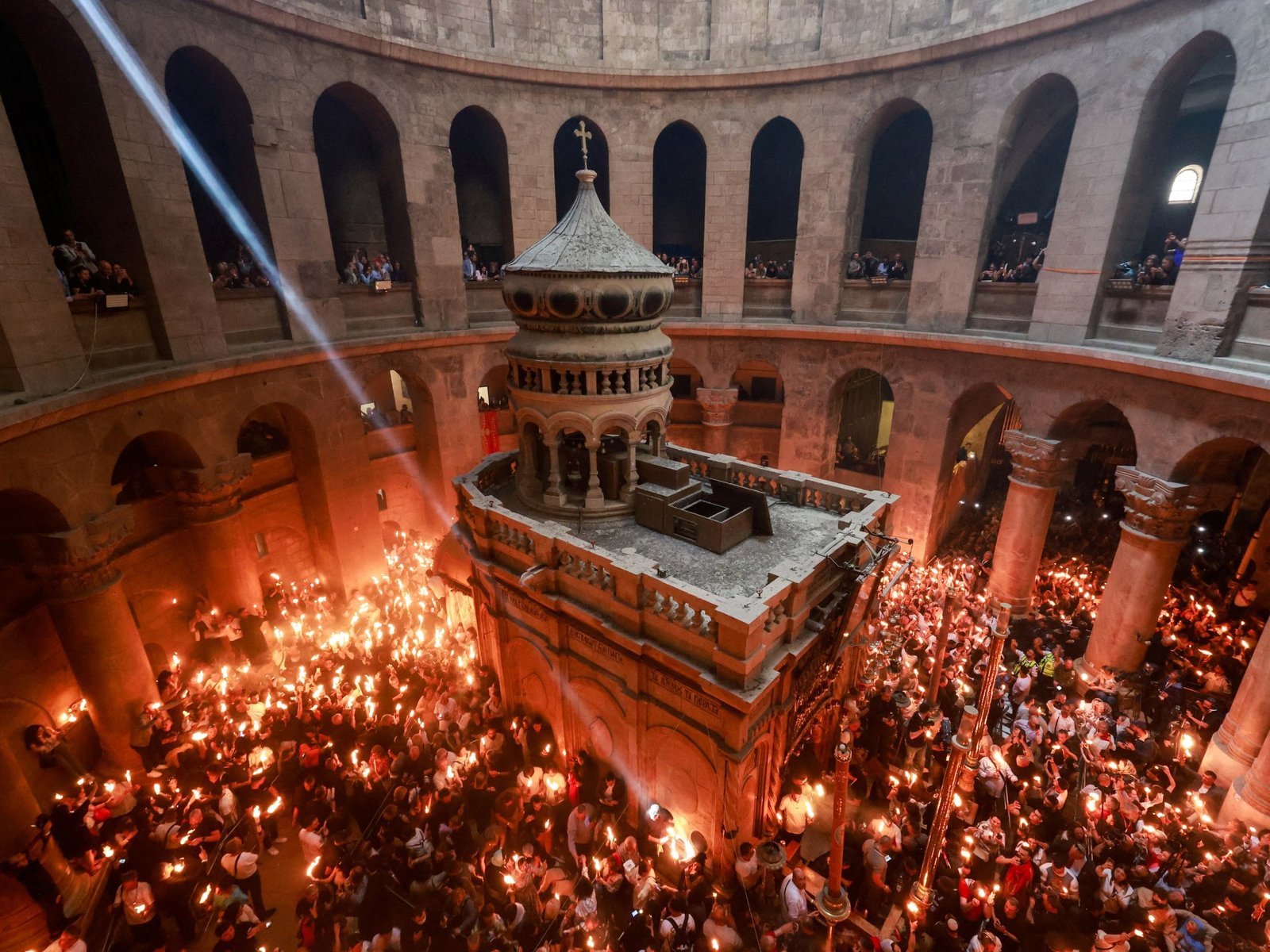 Thousands gather for centuries-old Holy Fire ceremony in Jerusalem | Jerusalem News