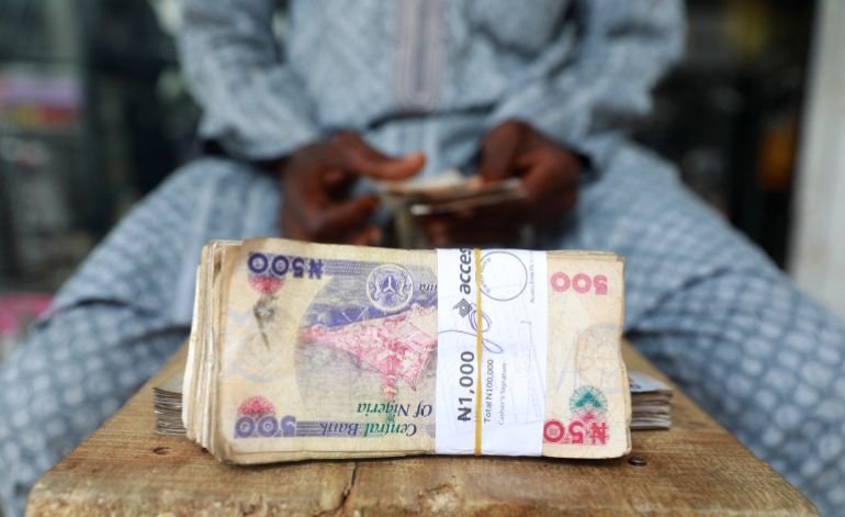‘I invested in a Ponzi scheme’: Nigerians fall victim to crypto scams | Poverty and Development News